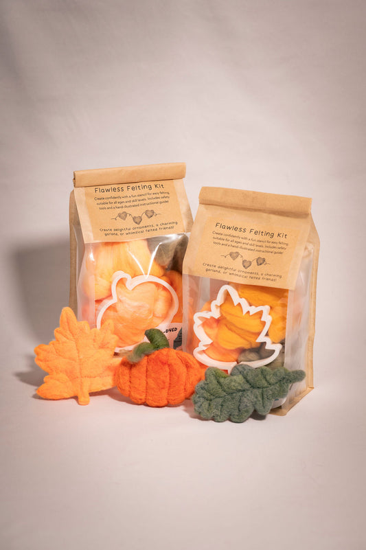 Felting kit to make felted pumpkins and autumn leaves.