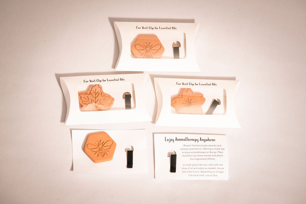 Set of essential oil diffuser components on a light background